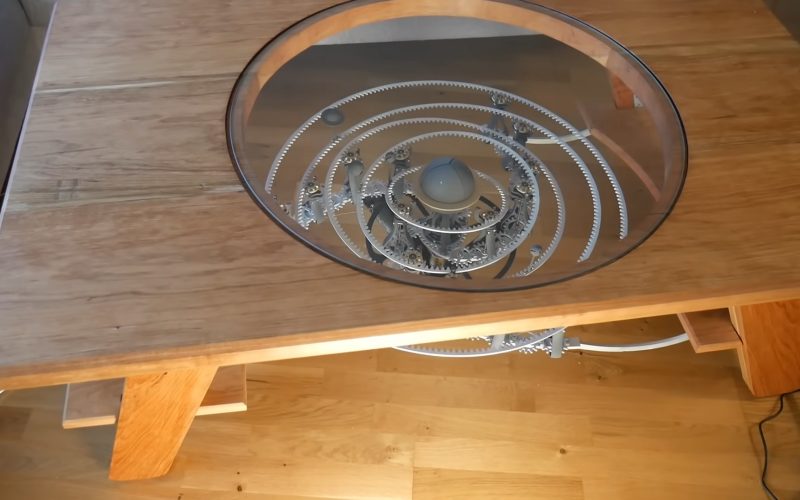 an-improbable,-doomed-star-system-in-a-clockwork-coffee-table